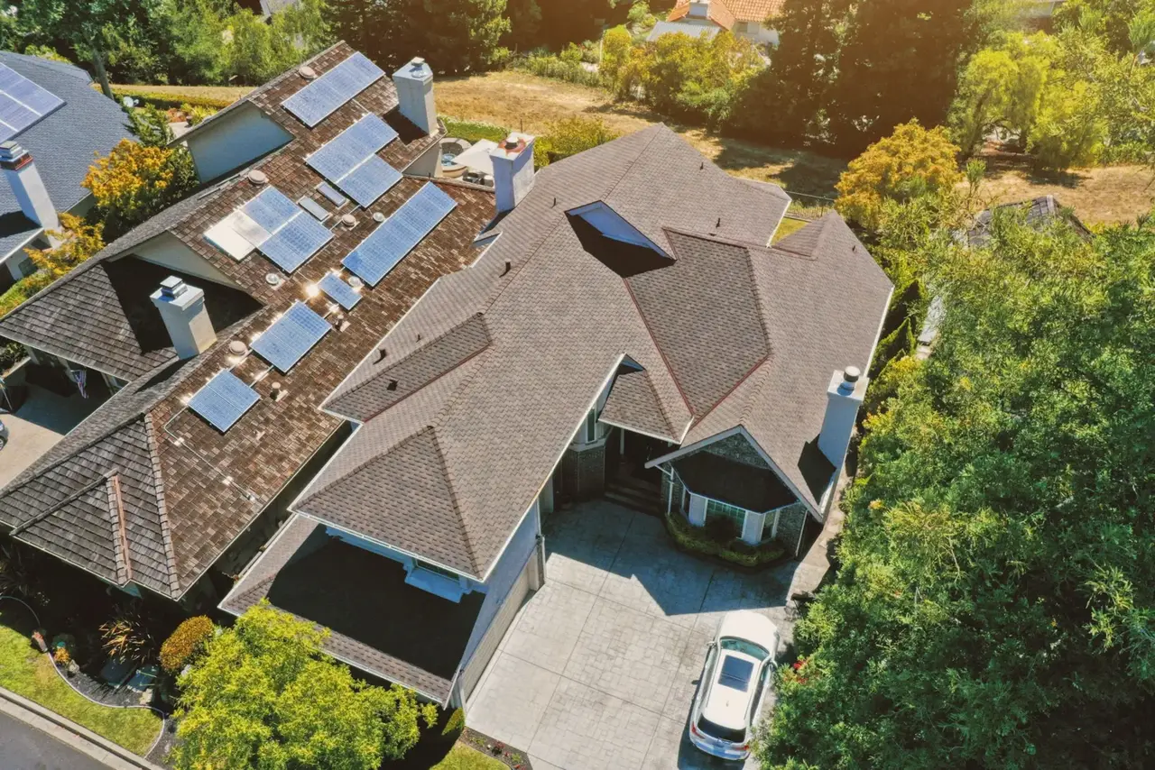 Home with rooftop solar panels installed by Spartan