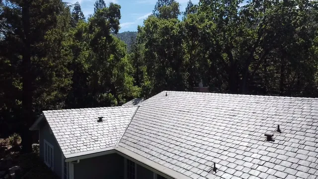 Synthetic slate roof slopes and finished edges