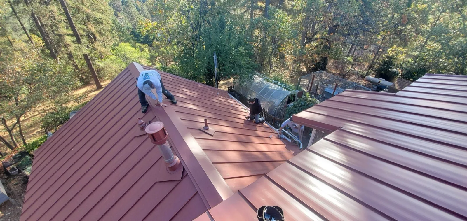 Spartan crew installing a standing seam metal roof